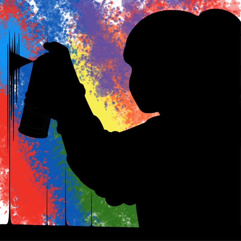 realistic teen girl spray painting a wall