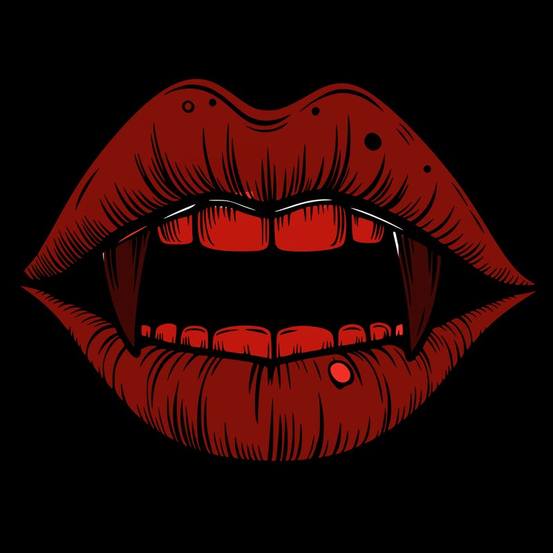 lips with vampire teeth