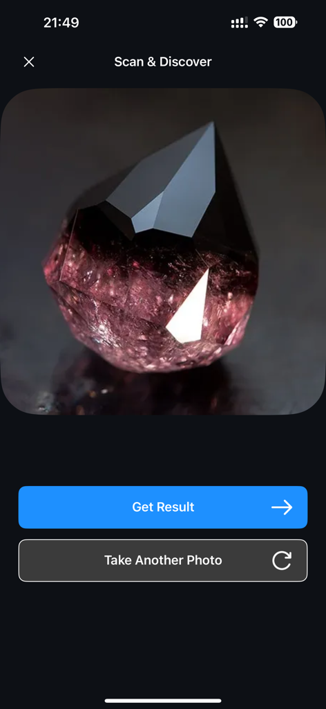 Rock Identifier: Stone Scan ID - Interface of the Rock Identifier app showing a scan of a faceted purple crystal with buttons to get result or retake photo