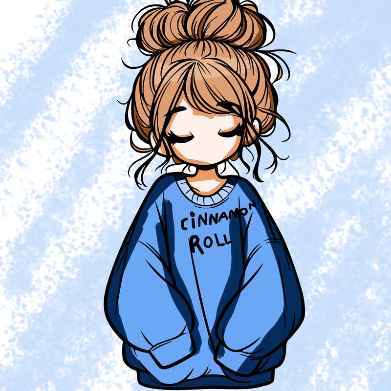girl with baggy sweatshirt and messy bun