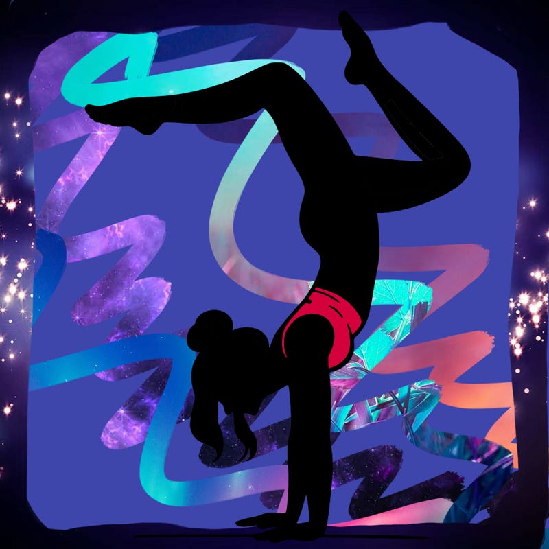 a woman doing a handstand