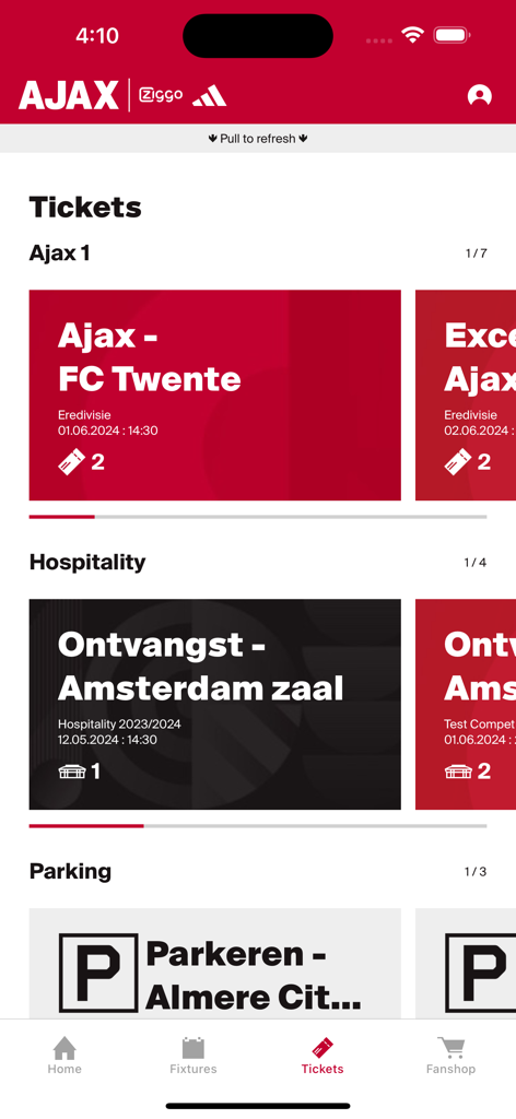 Ajax Official App - A mobile screen from the Ajax Official App displaying the tickets section with match options hospitality and parking details