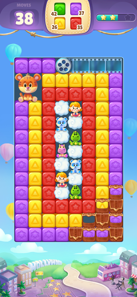Cube Rush Adventure - Tela de jogo do Cube Rush Adventure com cubos coloridos para estourar e personagens de brinquedo em um nível com tema de Hollywood