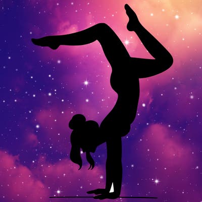 a woman doing a handstand