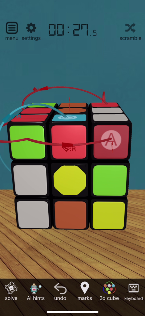 A virtual 3D magic cube with movement guides and a timer in the app interface