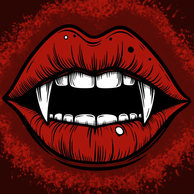 lips with vampire teeth