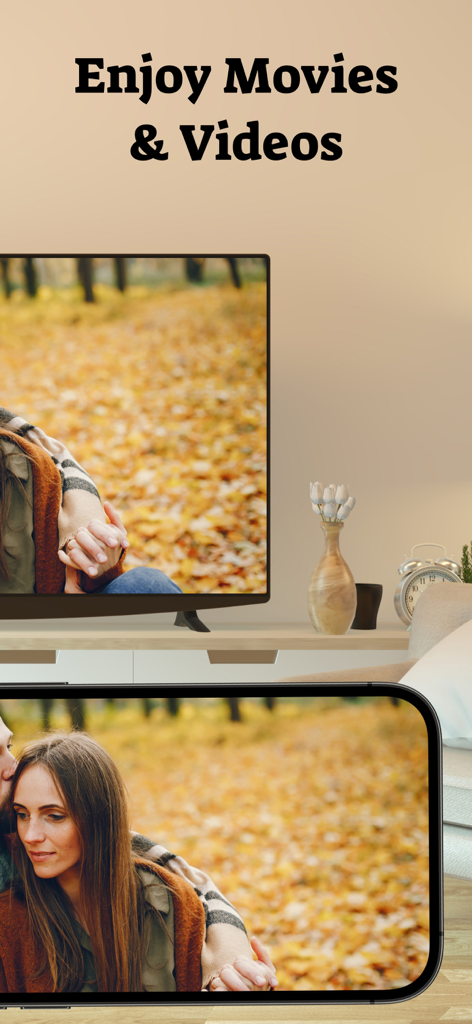 AirPlay : Screen Mirroring - Tela de um smartphone espelhando um vídeo de um casal para uma televisão grande