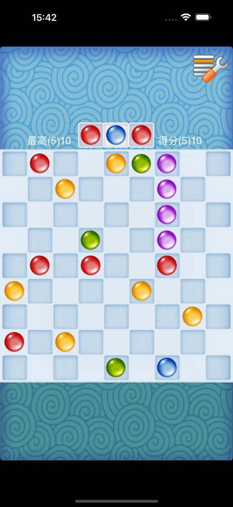 Line color - Line colorパズルゲームのゲームプレイ画面。グリッド上に色とりどりの球体が表示されています。