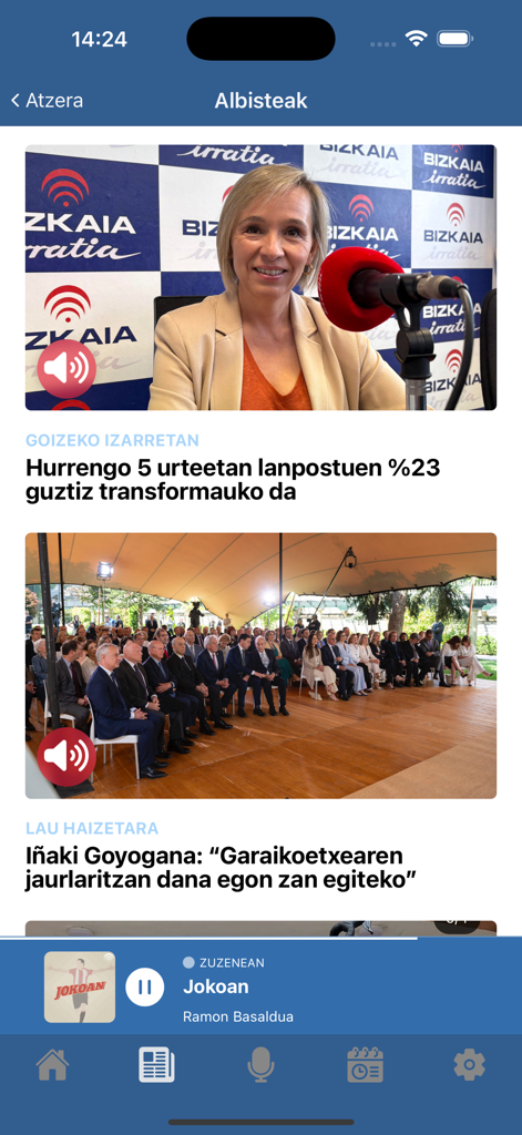 Bizkaia Irratia - Interfaz de la aplicación Bizkaia Irratia que muestra artículos de noticias vascas y una barra de reproducción de radio en directo.