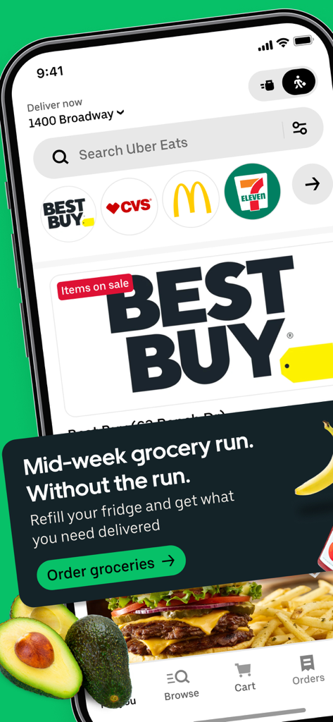 Uber Eats app screen showing options for grocery and retail delivery including Best Buy and CVS with a promotional banner for grocery shopping