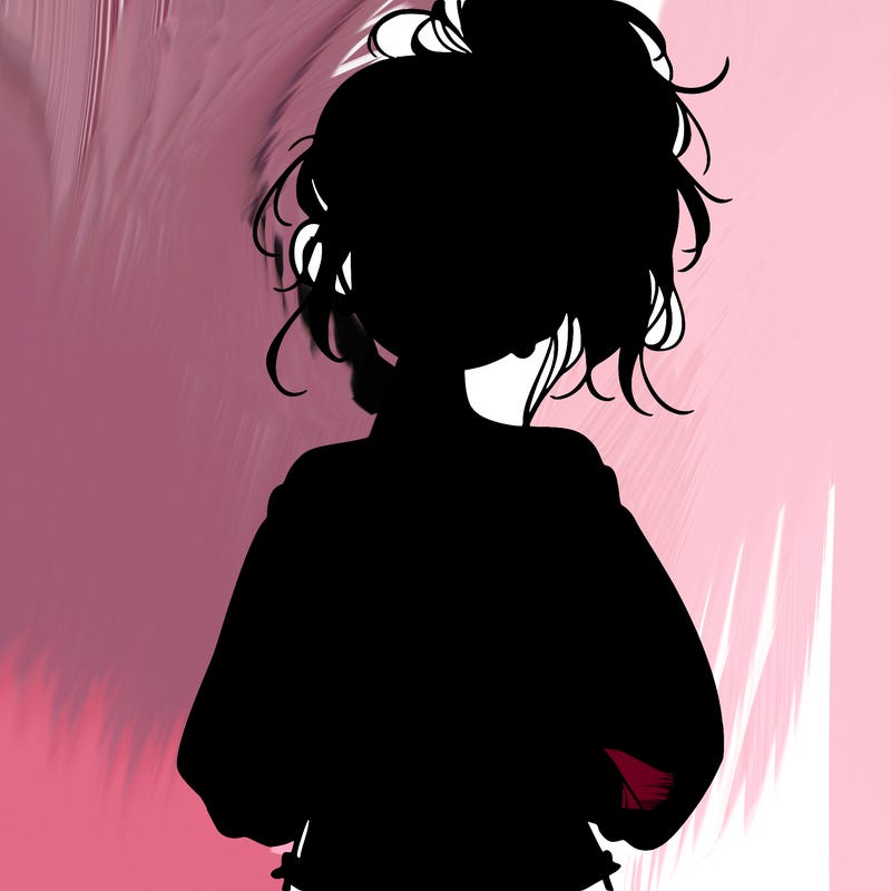 girl with a messy ponytail glasses a baggy crop top and jean shorts