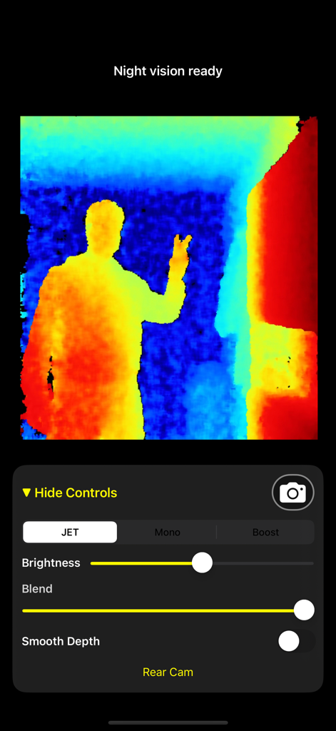 Night Eyes Vision - Night Eyes Vision app interface showing a thermal style depth map of a person with brightness and blend controls