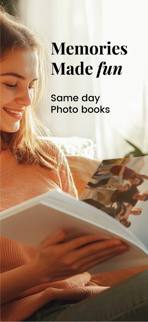 A smiling woman looking at a custom photo book with same day pickup messaging.