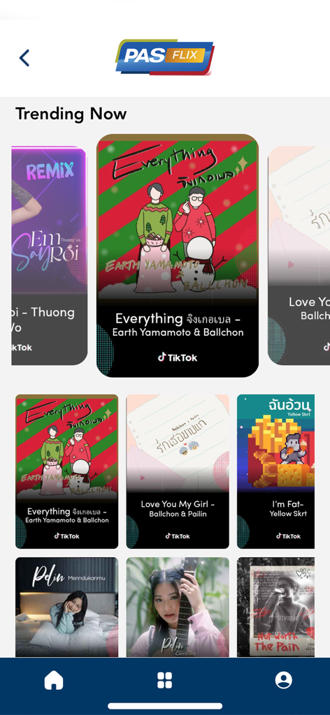 The Trending Now screen of the PASFLIX app showing music and video content thumbnails.