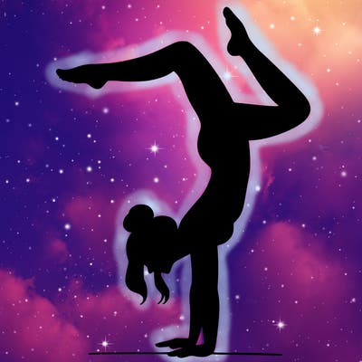 a woman doing a handstand