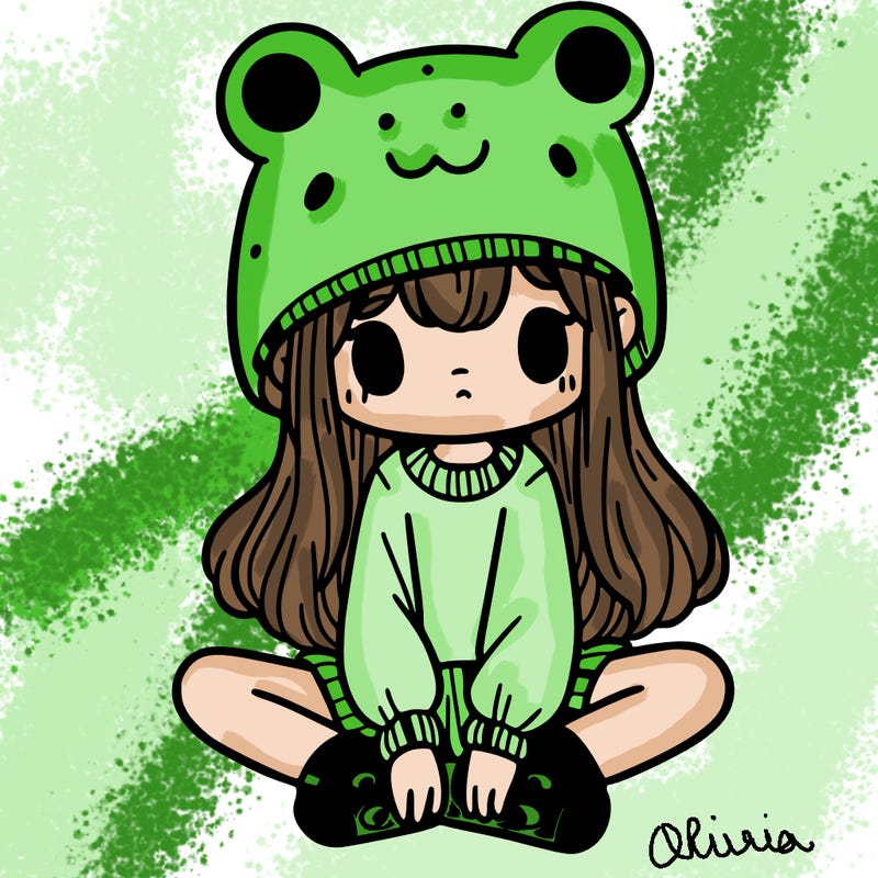 a girl wearing a frog hat and some frog socks