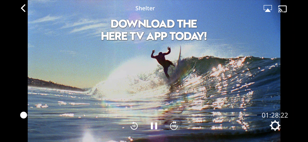 A scene of a surfer from the movie Shelter on the Here TV video player