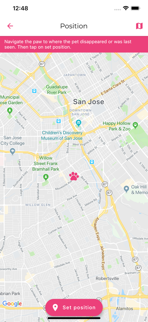 Map screen in the Missing Pets app showing a pink paw icon to mark where a pet was last seen.