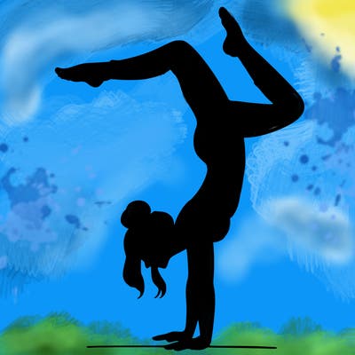 a woman doing a handstand