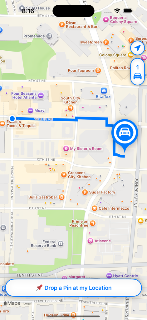 Find My Car: Tap, Select, Go - 도시 지역에서 주차된 차량까지의 도보 경로를 보여주는 내비게이션 지도 인터페이스.