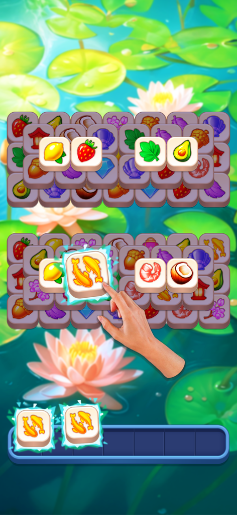 Match Jong - Zen Tile Puzzle - A hand tapping a goldfish tile in a zen triple tile matching puzzle with a lily pad and lotus flower background