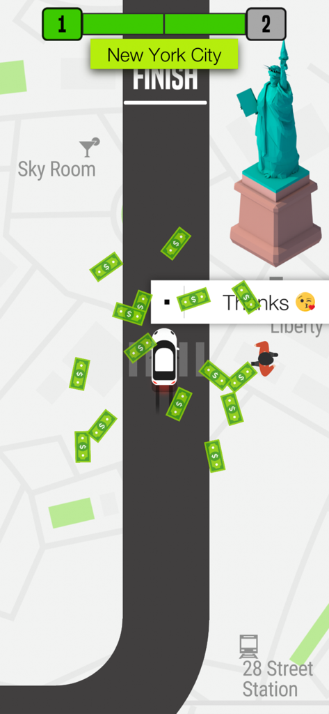 Pick Me Up™ - Vista dall'alto di un'auto bianca che finisce un livello a New York City con la Statua della Libertà e contanti volanti nel gioco Pick Me Up