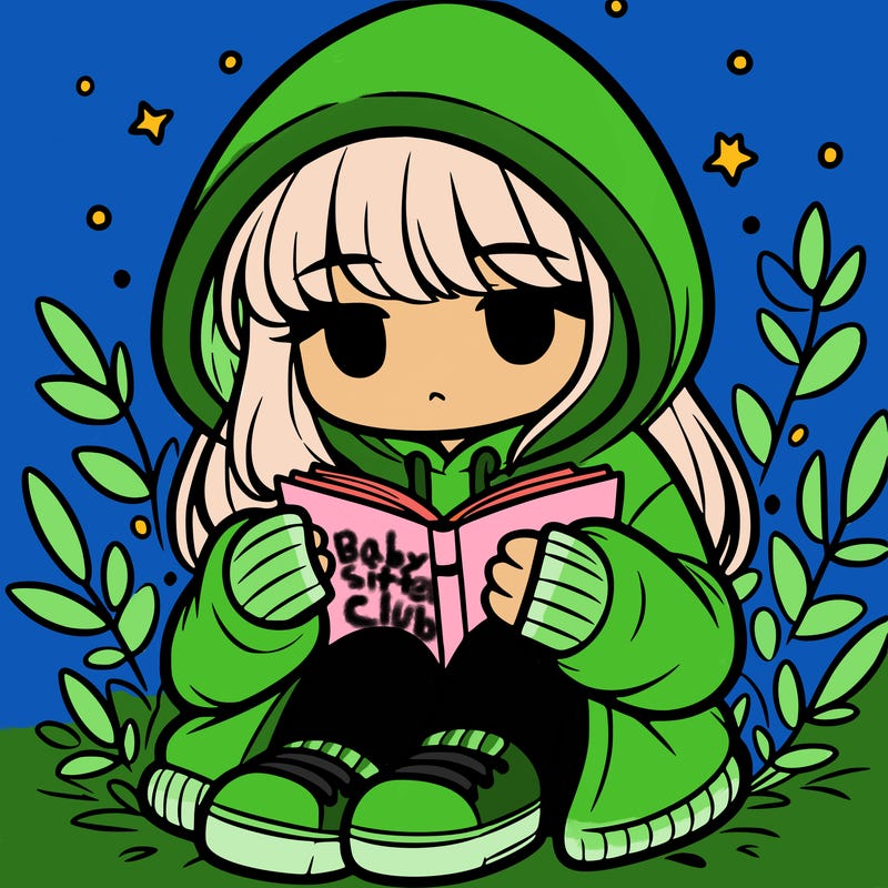 girl in oversized hoodie reading a book
