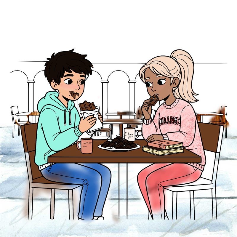 a boy and a girl sitting at a table eating chocolate and they’re in college