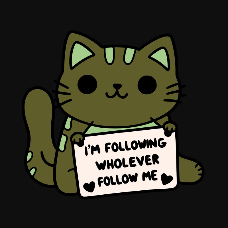 cat with a sign that says i’m following whoever follows me