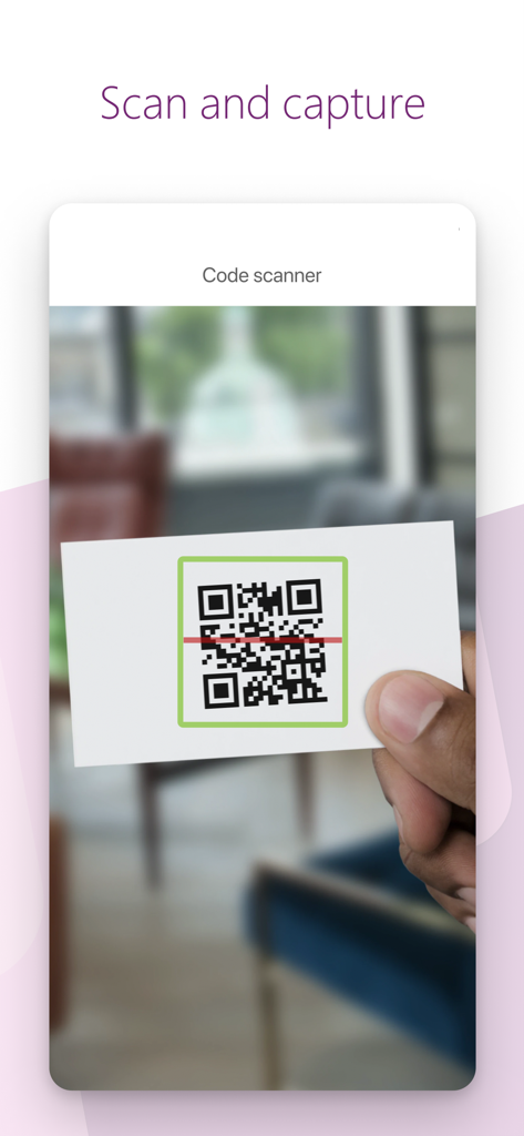 Power Apps - A person using the Microsoft Power Apps code scanner to scan a QR code on a business card