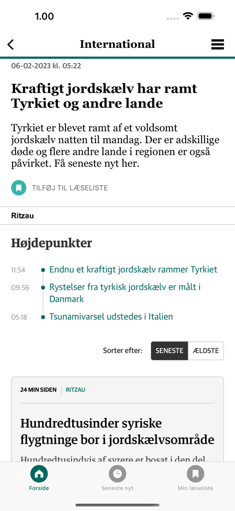Jyllands-Posten Nyheder - Jyllands-Posten news app interface showing an international article in Danish about an earthquake