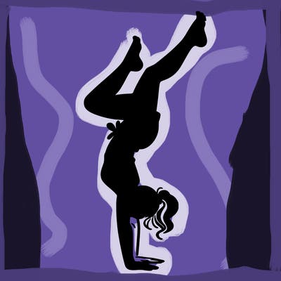 woman doing a hand stand