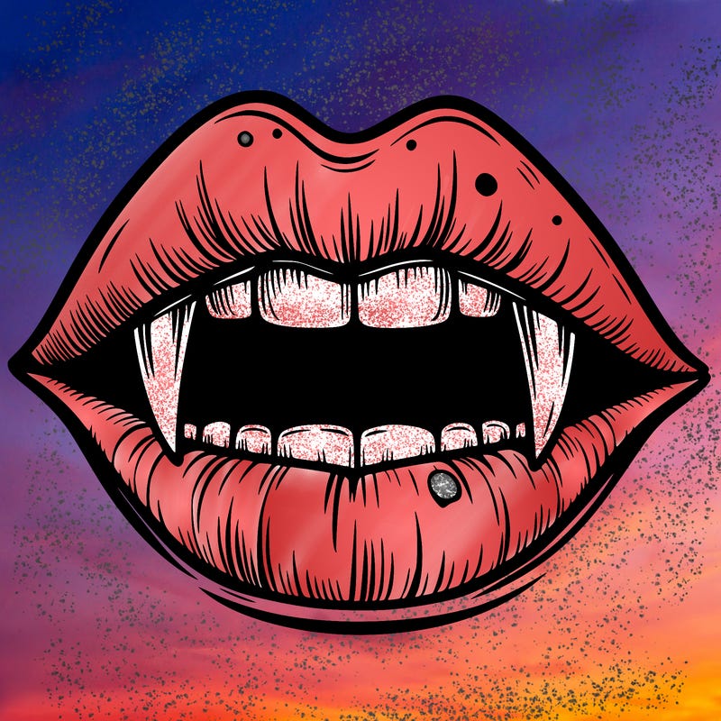 lips with vampire teeth