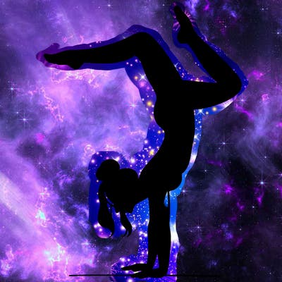 a woman doing a handstand