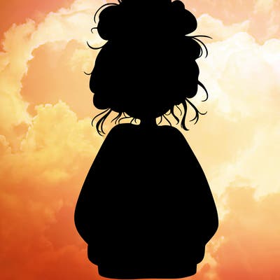 girl with baggy sweatshirt and messy bun