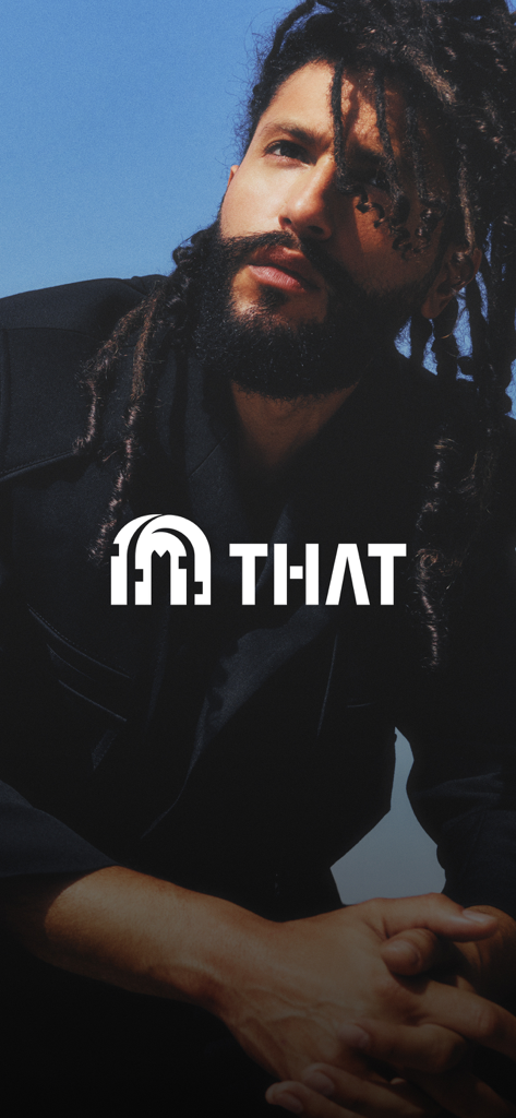 THAT Concept Store - Shopping - Schermata di avvio per l'app THAT Concept Store con un modello maschile con dreadlocks e il logo bianco THAT