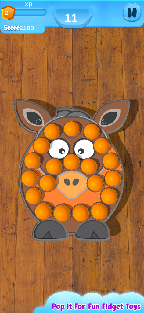 Fidget Toys 3D - Pop It Game - Animal shaped 3D pop it fidget toy with orange bubbles on a wooden floor
