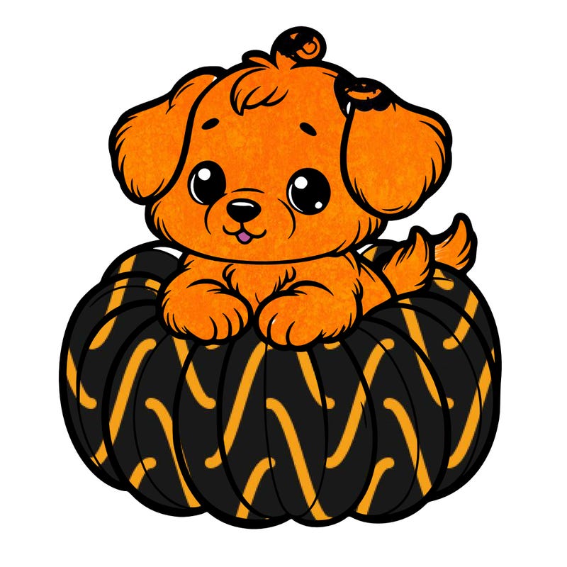 cute little puppy in a pumpkin