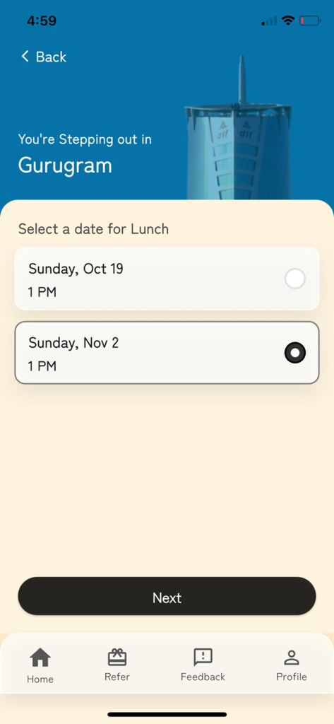 StepOut World - StepOut World app screen showing options to select a date and time for a curated lunch in Gurugram