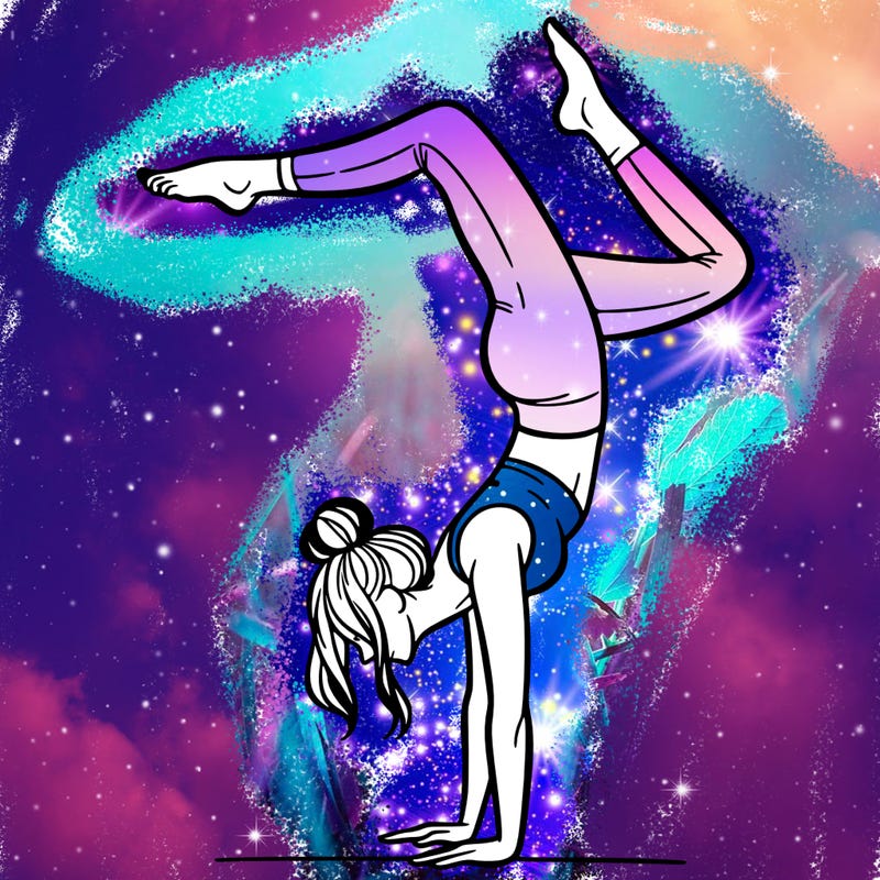 a woman doing a handstand