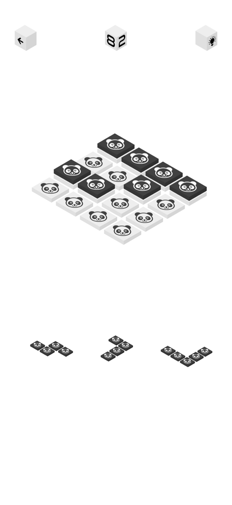 Black Block Blast - Black Block Blast gameplay showing an isometric puzzle board with black and white panda themed tiles.