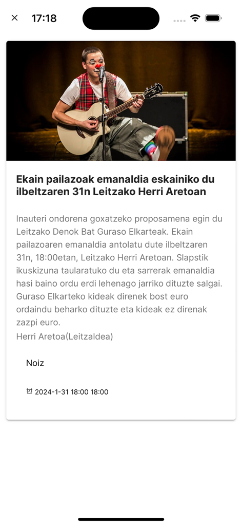 Local news article in the Erran app featuring a clown performance in Leitza