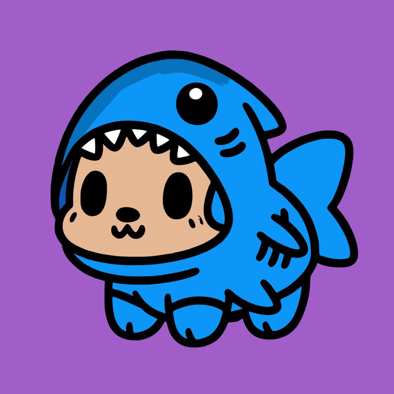 cute dog wearing a shark costume