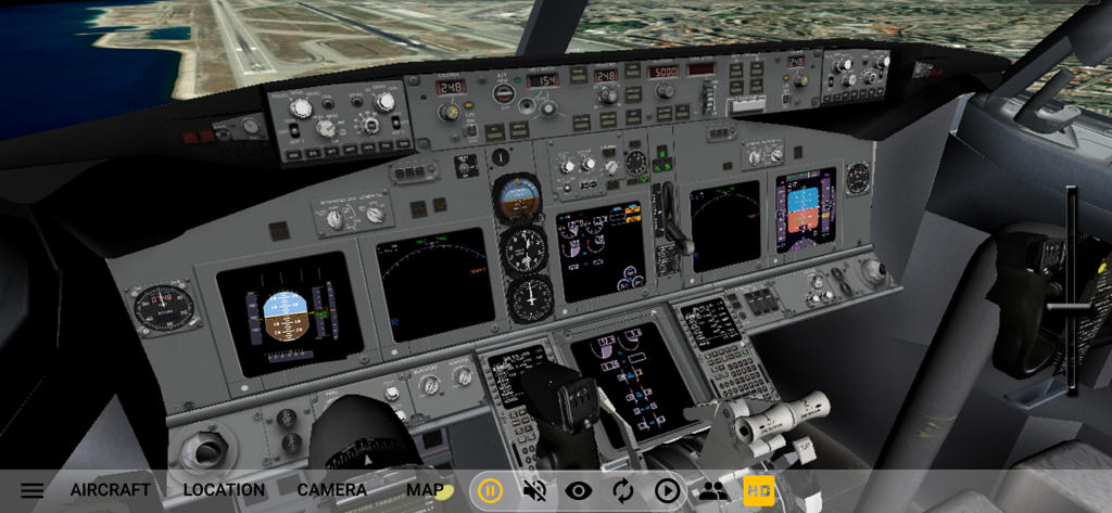 Instrumented cockpit of a commercial airliner in GeoFS Flight Simulator showing flight displays and navigation controls