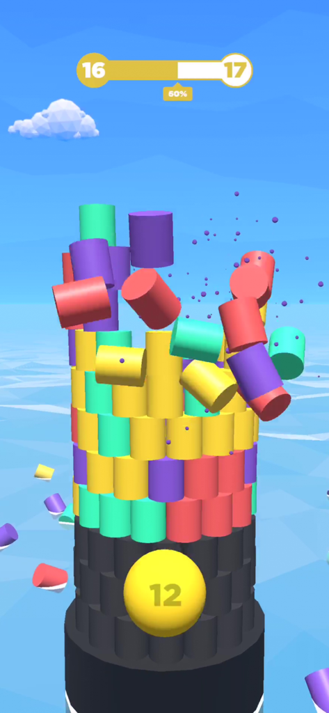 Tower Color - Hit and crash! - A 3D tower of colorful blocks collapsing after being hit by a ball in the Tower Color mobile game.