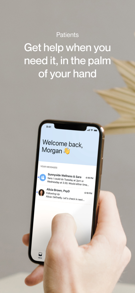 Spruce: Medical Communication - A hand holding a smartphone displaying the Spruce app patient inbox with messages from healthcare providers