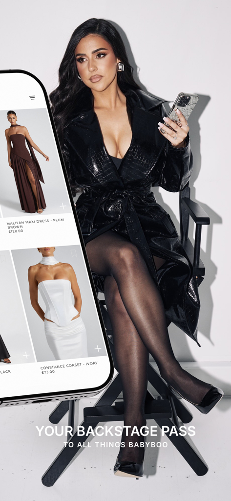 Una mujer elegante navegando por la app BABYBOO en busca de vestidos exclusivos y moda de moda