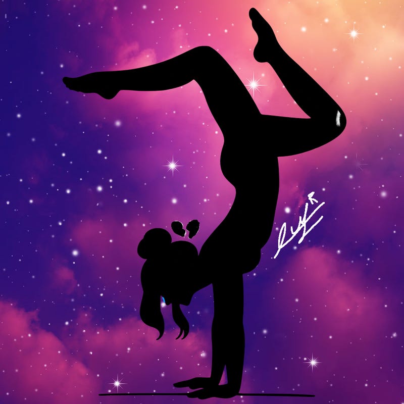 a woman doing a handstand