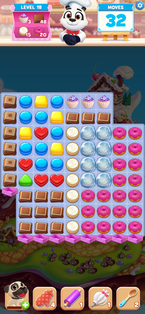 Tela de jogabilidade do Cookie Jam Match 3 mostrando uma grade de quebra-cabeça de doces coloridos com o Chef Panda.