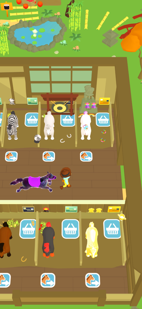 Horse Life - Horse Lifeのカラフルな厩舎を真上から見た様子。虹色のユニコーンと紫の馬に乗るプレイヤーが表示されている。